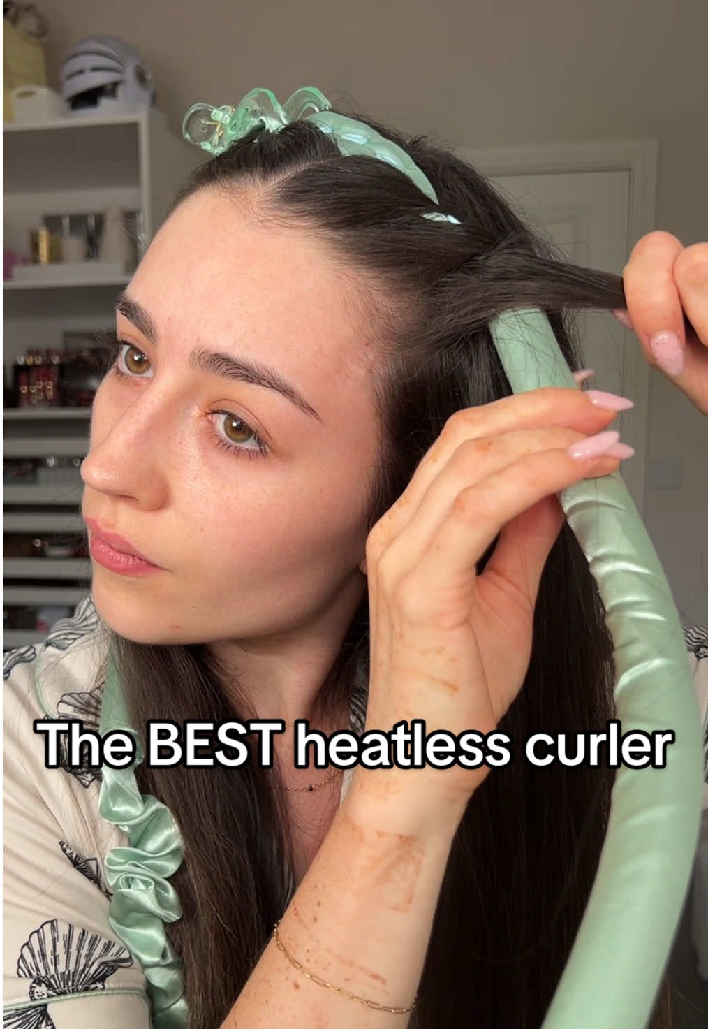 TikTok post by @maggieanne.n for Give Me Cosmetics. Caption reads: [...] only heatless curler I use now! @Give Me....