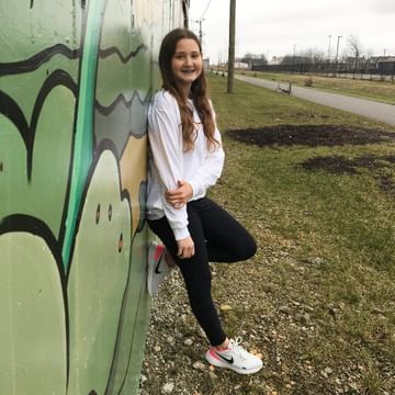 Instagram post by @briannah_howard for Champion Teamwear. Caption reads: [...] to IGNITE the spark ⚡️ 

Shirt:....