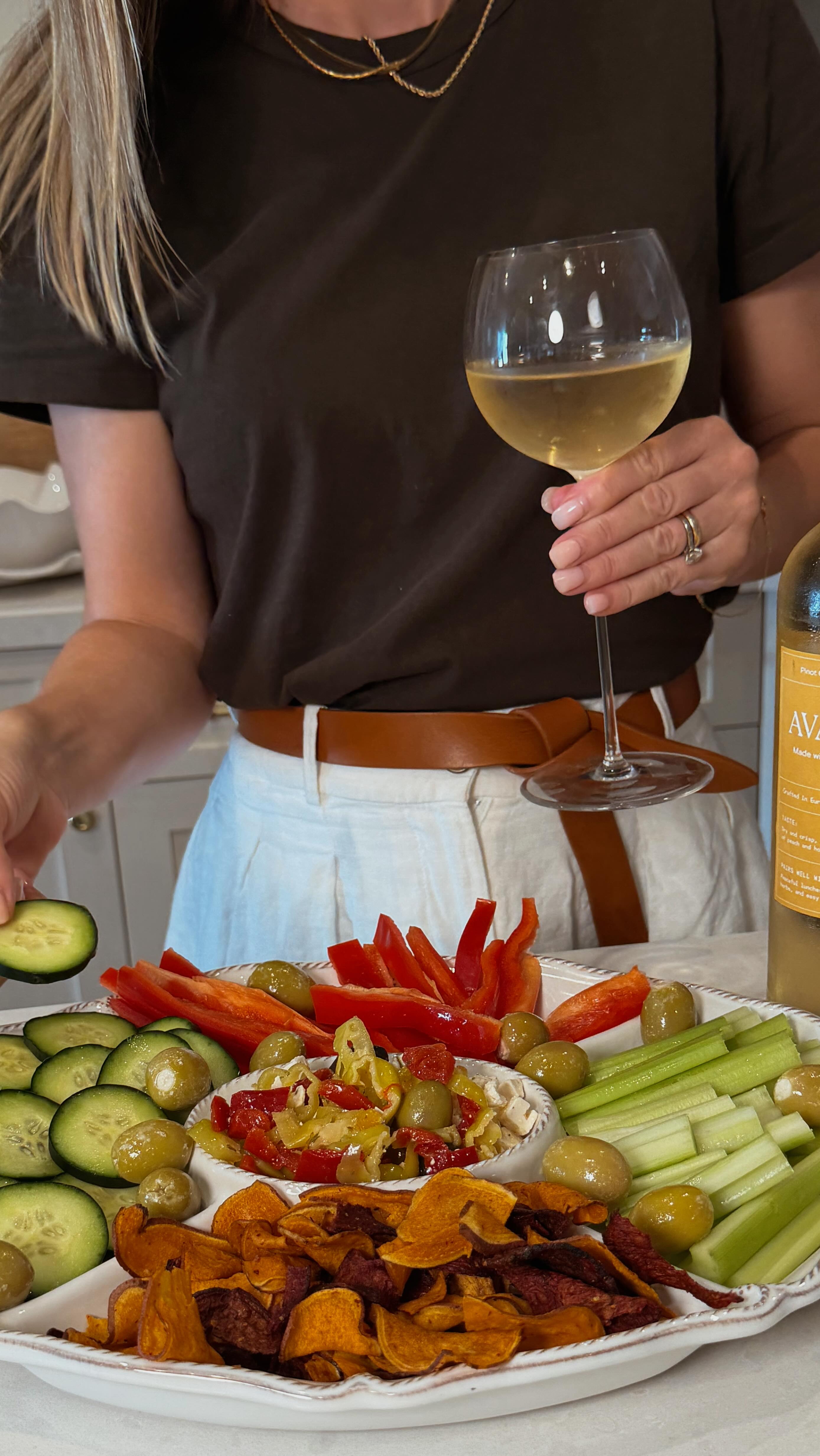 Instagram post by @laurenhoffman0 for Avaline. Caption reads: My go-to table wine @avaline Pinot Grigio. Get....