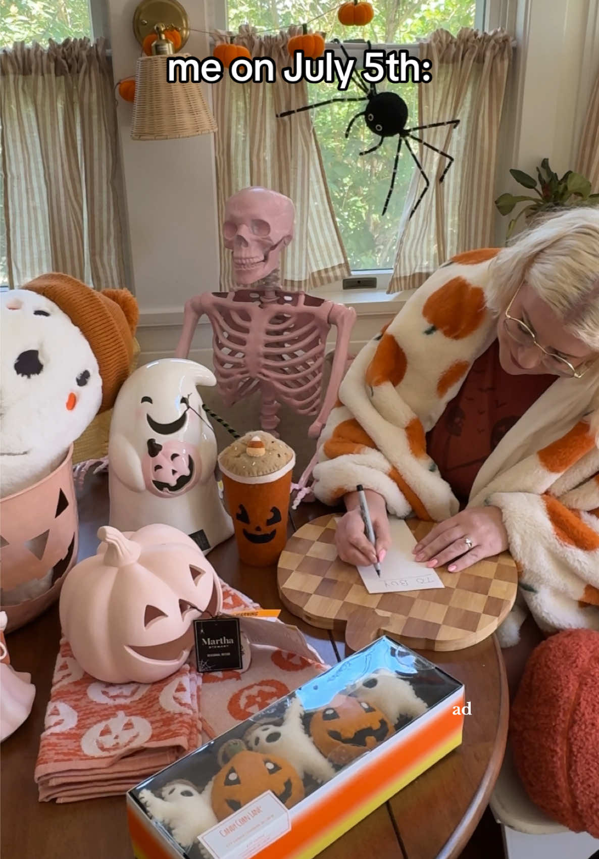 TikTok post by @emilywelchstyle for Homegoods. Caption reads: CODE ORANGE 🎃👻  Literally RAN to my closest....