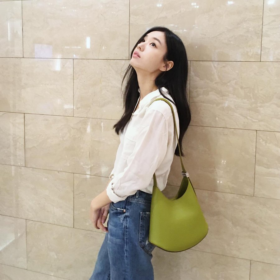 Instagram post by @eunjin___a for JIL SANDER. Caption reads: 🍀🍀🍀.