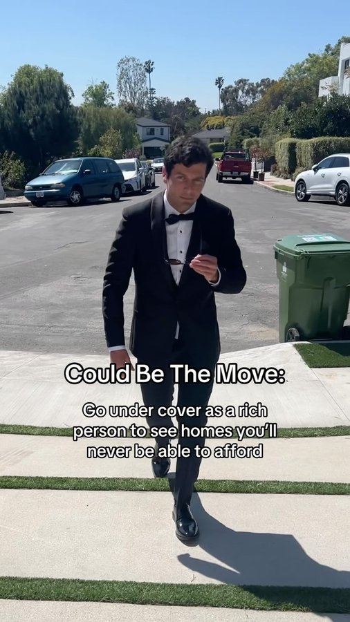 Instagram post by @goood.desmond for The Black Tux. Caption reads: a good suit can open any door @theblacktux....