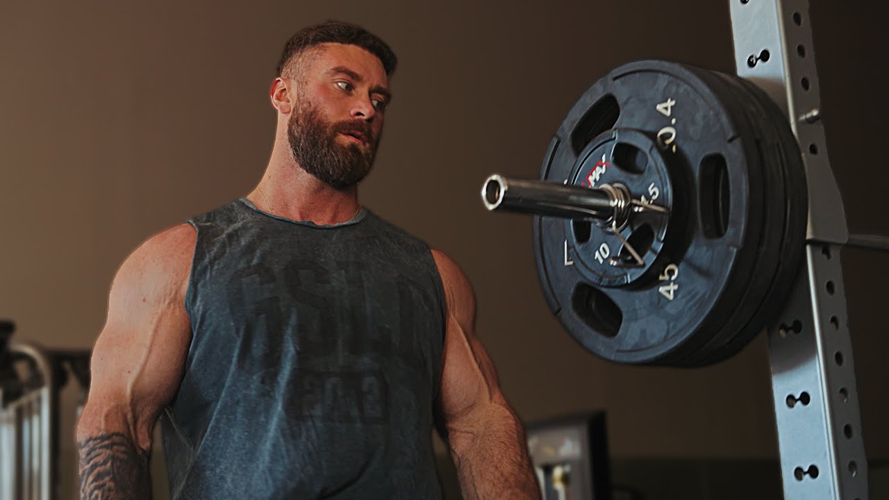 YouTube post by @ChrisBumstead for Megafit Meals. Caption reads: Leg Day for Power and Mobility.