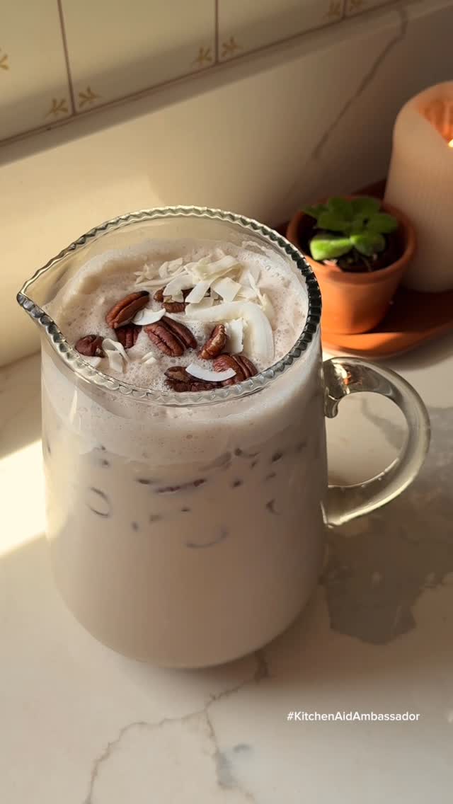 Instagram post by @alexafuelednaturally for Kitchenaid. Caption reads: Agua de Nuez y Coco | Pecan Coconut Agua....