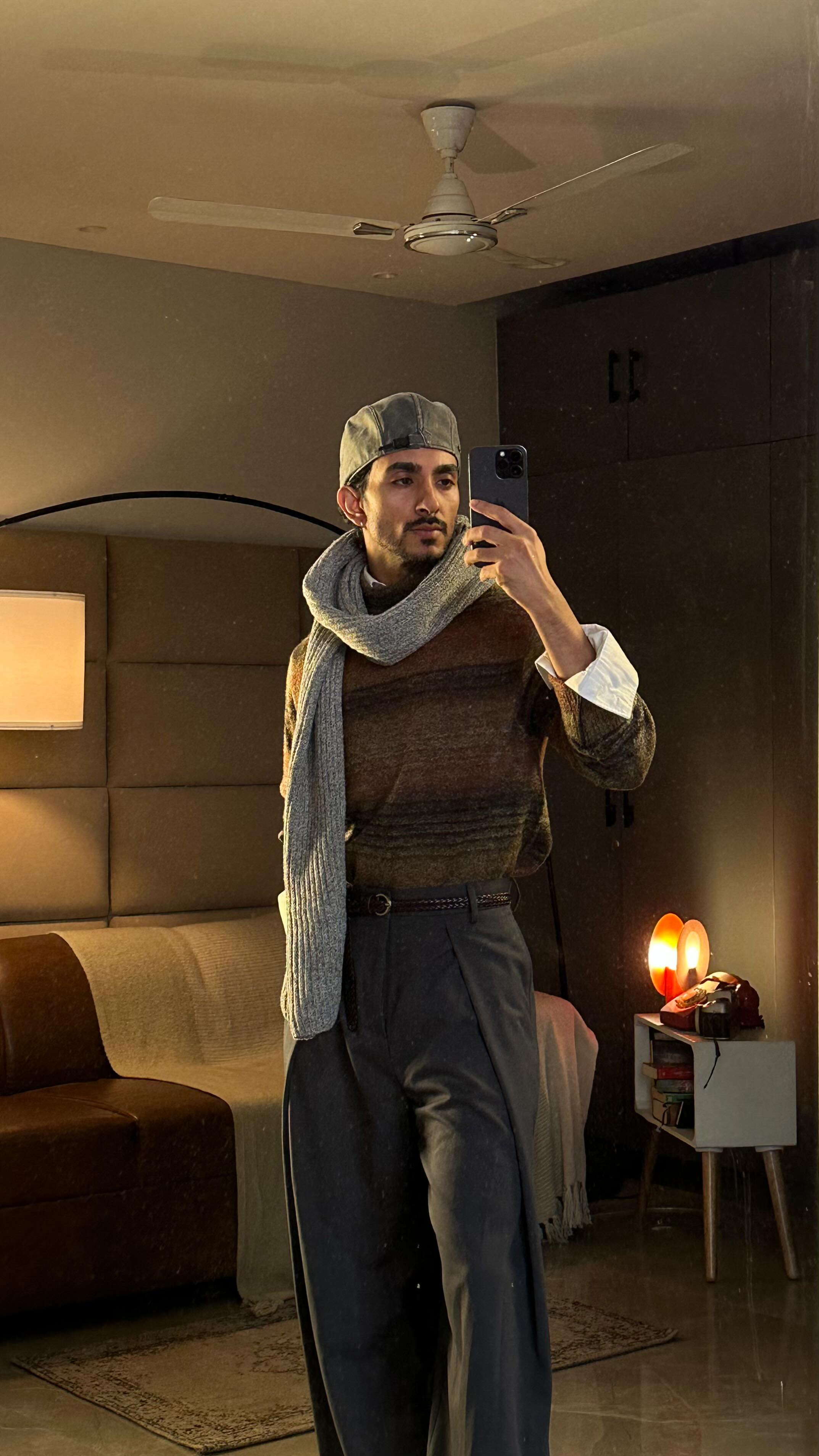 Instagram post by @mencrucials for RARE RABBIT. Caption reads: It’s definitely a statement piece 

Sweater and....