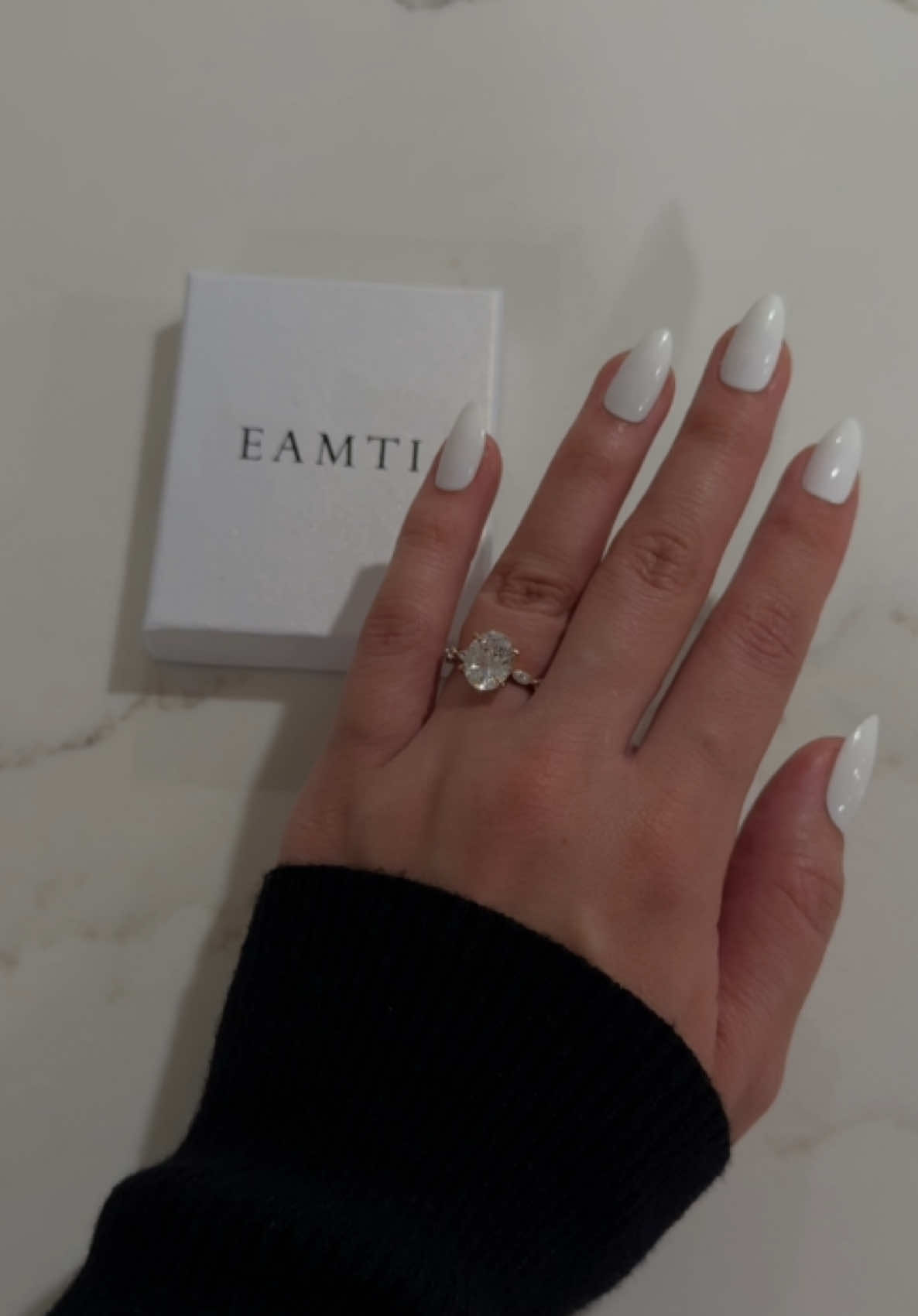 TikTok post by @leahfrzr for EAMTI Jewelry. Caption reads: perfect travel or promise ring 💍✨ @EAMTI....