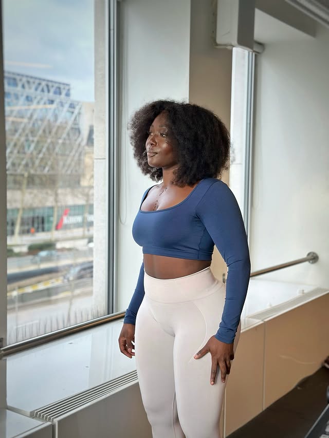 Instagram post by @joelleyossa.fitness for Women's Best. Caption reads: She is made of sunlight ☀️🫦 —— #womensbest....