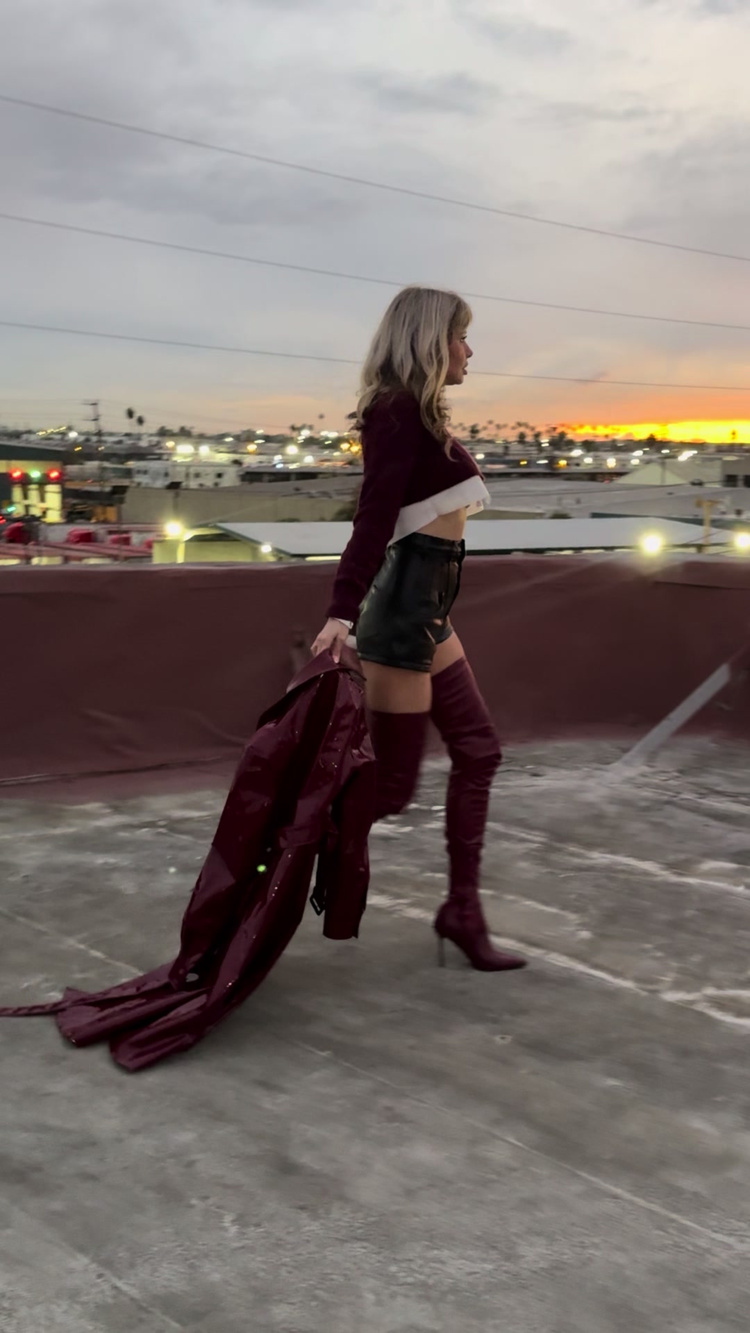 TikTok post by @yuliyalasmovich for ShopAKIRA. Caption reads: Those boots 😍 #tiktokshop #dresses #outfitinspo....