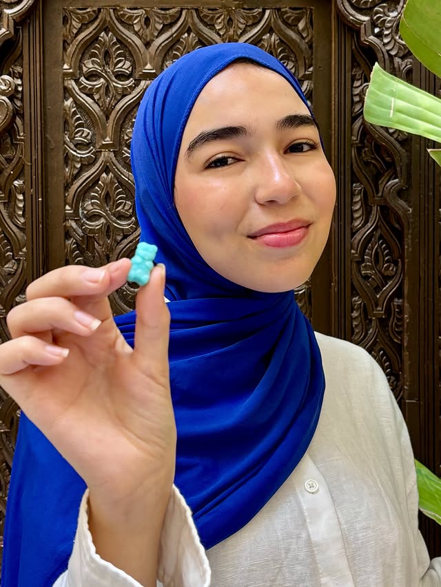 Instagram post by @rimbairouk for SugarbearPRO. Caption reads: Ad🐻@sugarbearpro hair vitamins keeps my
hair....