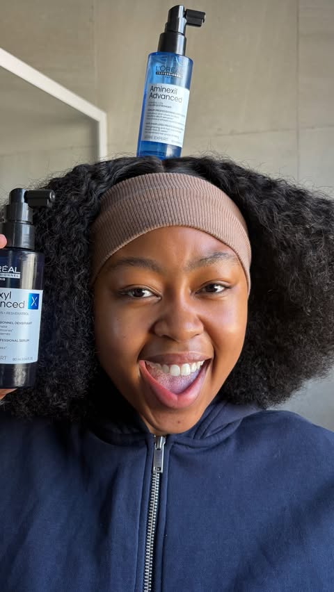 Instagram post by @mpumelelo.oo_ for L’Oréal Professionnel Paris ZA. Caption reads: The solution to my long lasting confidence is....