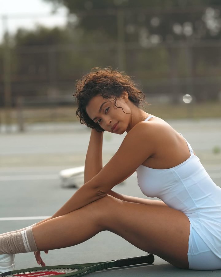 Instagram post by @ashleymariie__ for TAVI. Caption reads: Tavi tennis time 🎾🤍 @taviactive #ad.