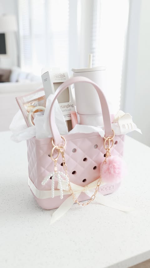 Instagram post by @itsemilyleah for BOGGBAG. Caption reads: [...] Bag and *COMING SOON* Bag Charms....