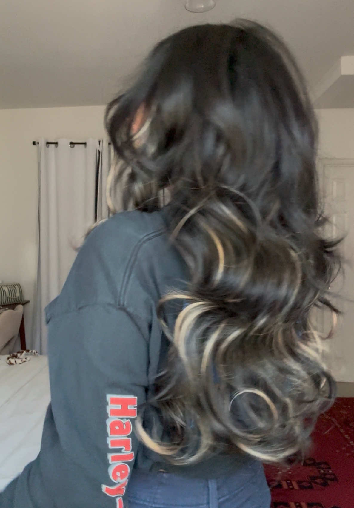 TikTok post by @lynnroxana for Vigorous Beauty. Caption reads: layered black mix highlights 🪄📓@Vigorous Beauty....