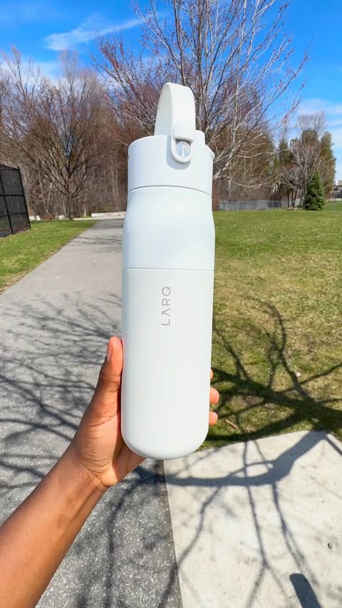 Instagram post by @aashleycarla for LARQ. Caption reads: Hydration upgraded, thanks to the LARQ PureVis 2....