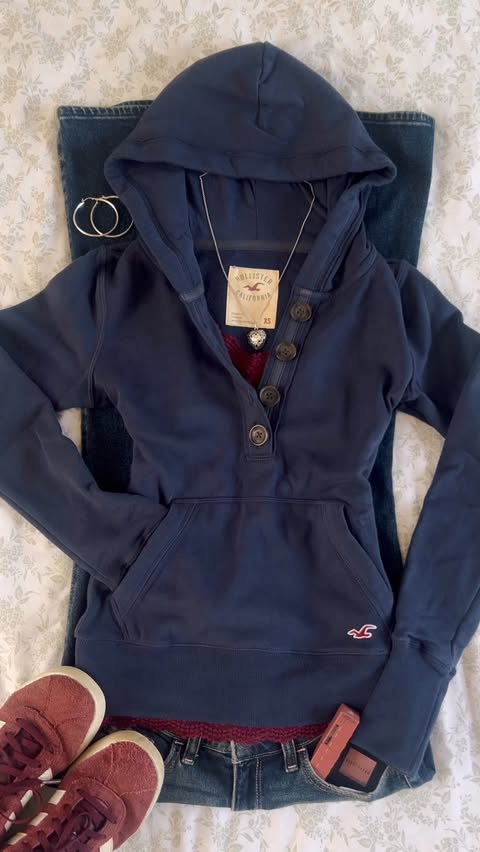 Instagram post by @lilyofthevalley081 for Hollister. Caption reads: [...] season and this new button hoodie from....