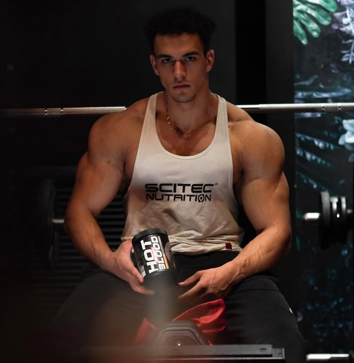 Instagram post by @alibl.fit for Scitec Nutrition. Caption reads: Power every rep with Scitec 💪
Use ALIB10 for your....