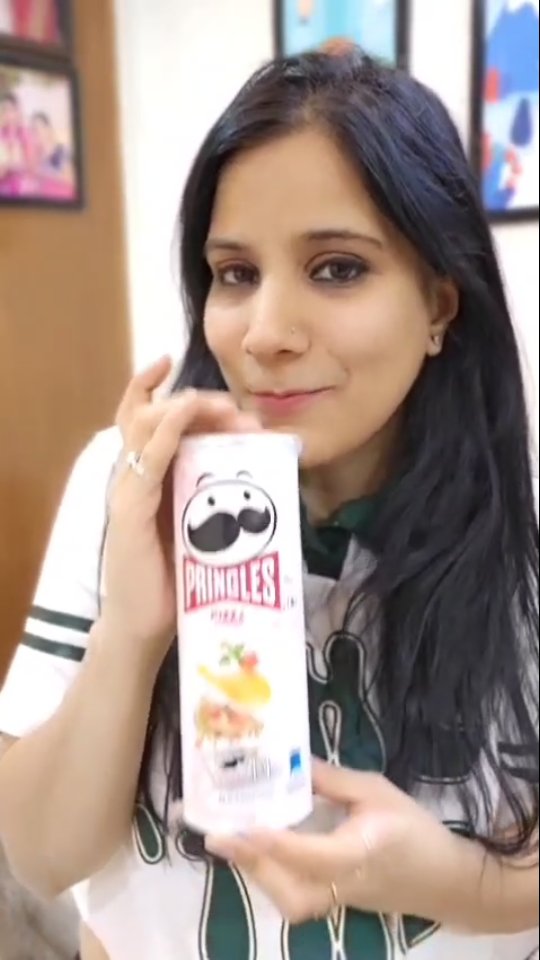 Instagram post by @dolly.lifestyle.official for Pringles. Caption reads: Calling all selfie pros! 📸Here’s the challenge....