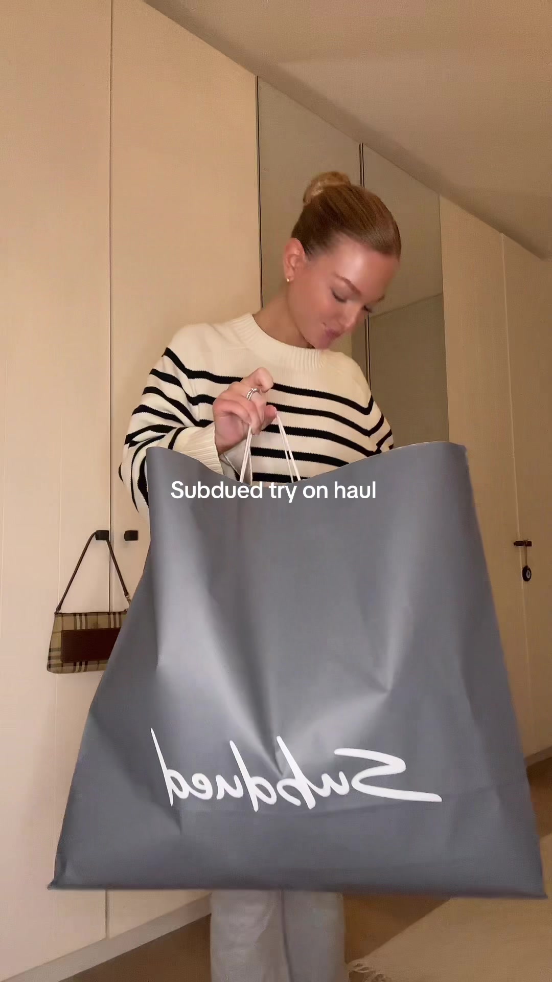 TikTok post by @amber.balota for Subdued. Caption reads: (Advertentie) @Subdued haul 🤍#subduedhaul....