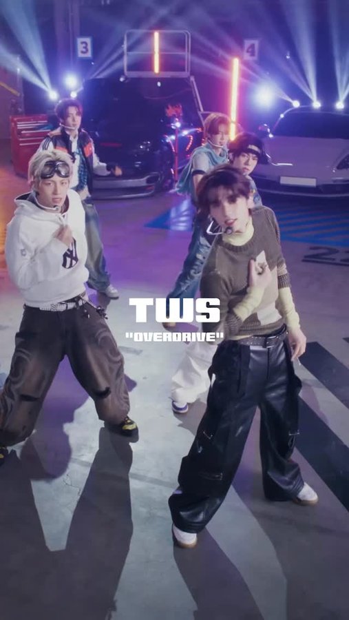 Instagram post by @tws_pledis for Genius. Caption reads: @tws_pledis made their #openmic debut with....