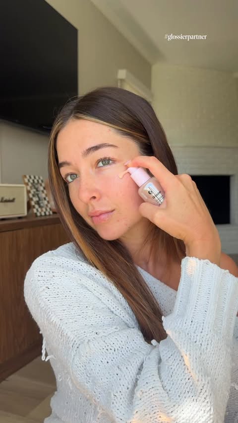 Instagram post by @mckenzieluskey for Glossier. Caption reads: [...] or energy for a full face of makeup,....