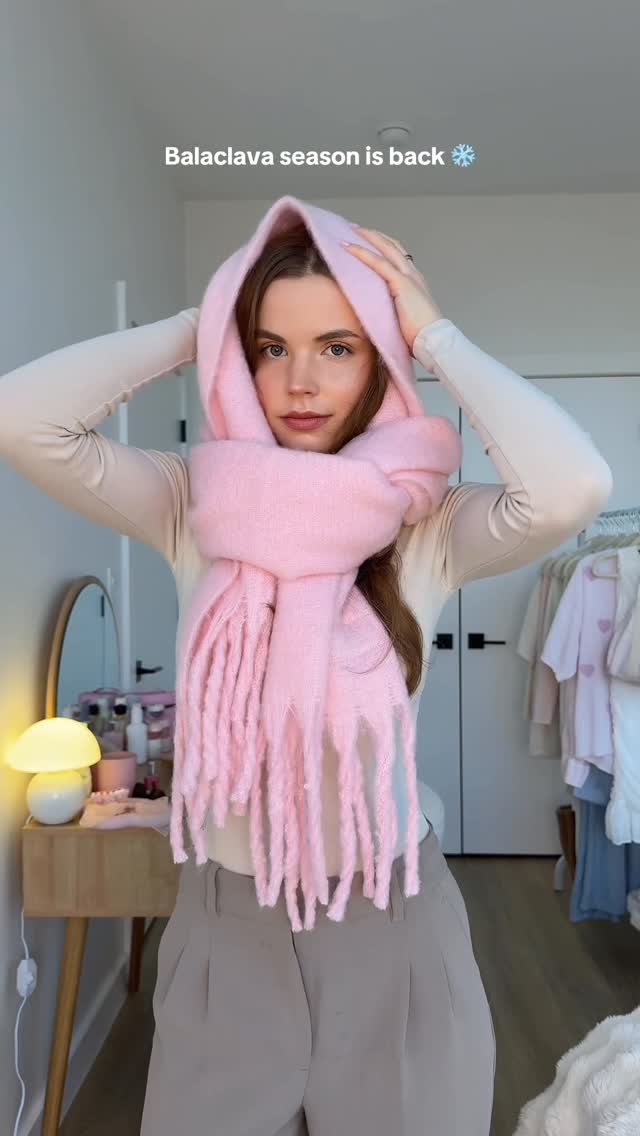 Instagram post by @fit_withdora for PrettyLittleThing. Caption reads: Save this scarf hack ❄️🫶🏻 #scarftutorial....