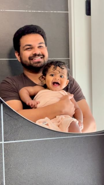Instagram post by @deepthi.bhat for Dreamland Baby. Caption reads: Baby girl’s bed time routine with dada 🫧🤍....