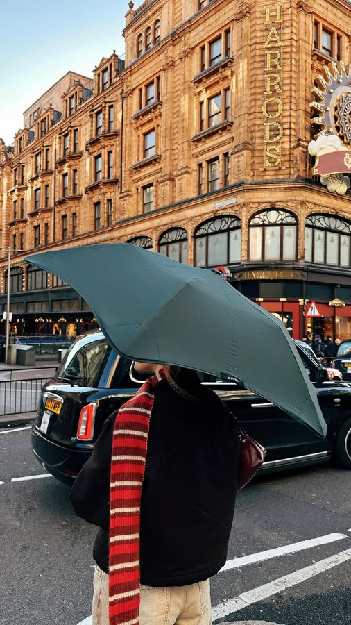 Instagram post by @chloekathbutler for BLUNT Umbrellas. Caption reads: [...] and truly the season for rain AD....