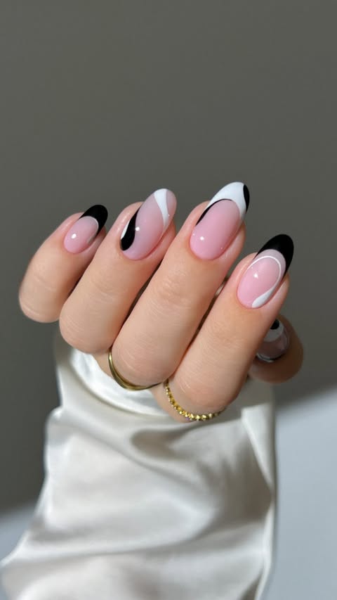 Instagram post by @heygreatnails for Apres Nail. Caption reads: [...] colors, maximum impact 🖤🤍....