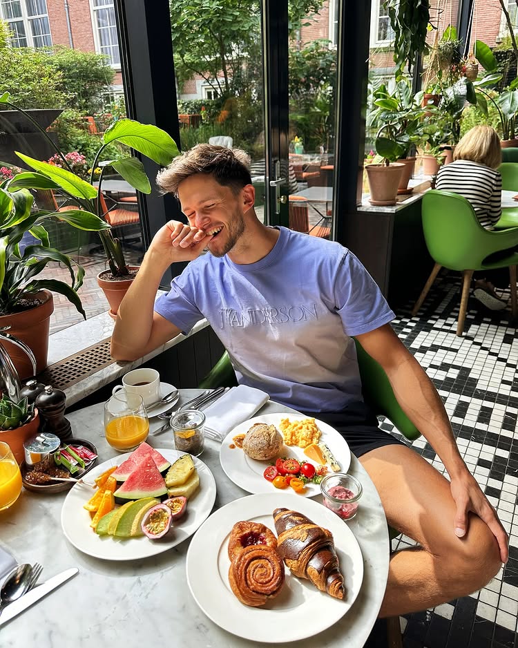 Instagram post by @tompriorthesecond for The Gay Passport. Caption reads: Cosy nights, lively days. Blessed to be Grand ✨ in....