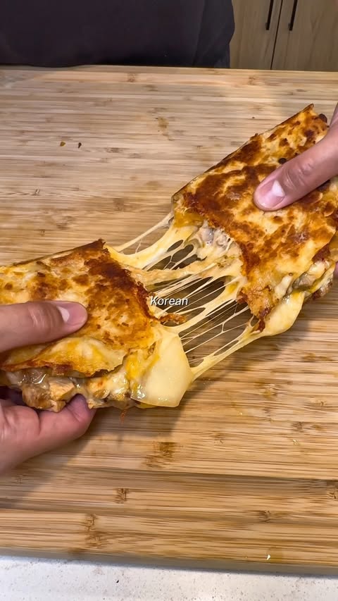 Instagram post by @bisongainz for Dan-O's Seasoning. Caption reads: [...] elite quesadilla 🔥 And the secret?....