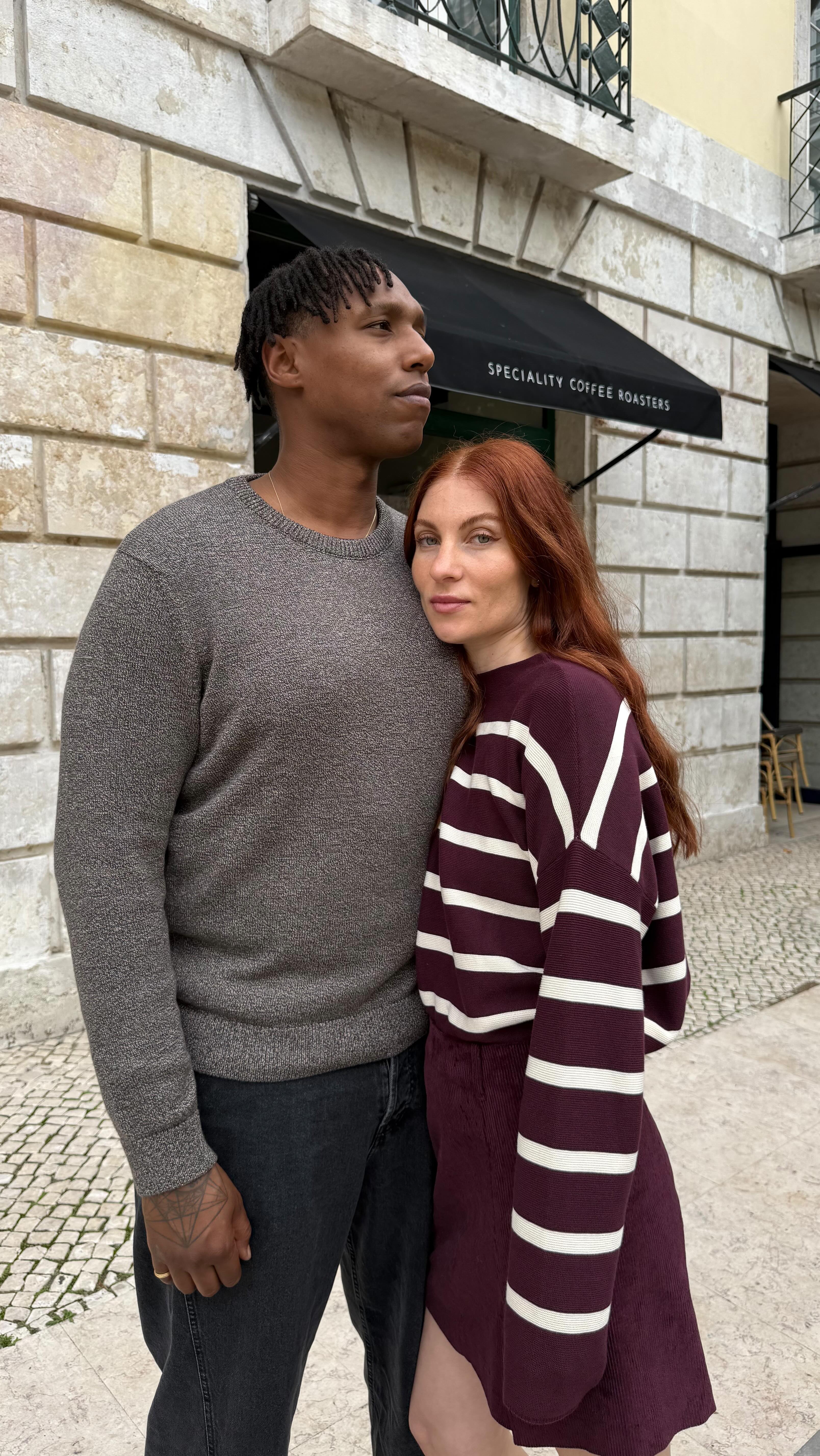 Instagram post by @lisa__mase for ARMEDANGELS. Caption reads: [ad] Lisbon autumn walks in @armedangels knit....