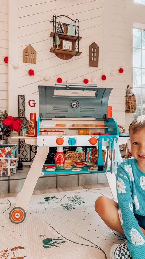 Instagram post by @aubreyycook for Melissa & Doug. Caption reads: #ad All he wanted this Christmas was to be just....