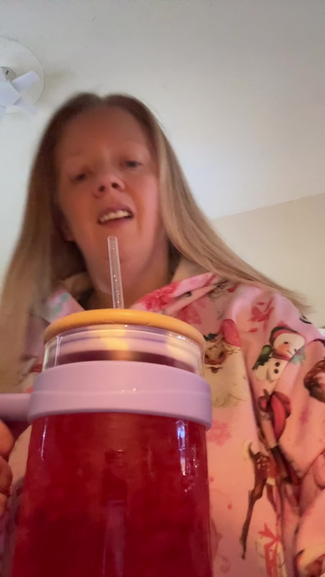 TikTok post by @christie.mk4u for Tronco. Caption reads: 40oz glass Tronco cup with rubber grip on bottom....