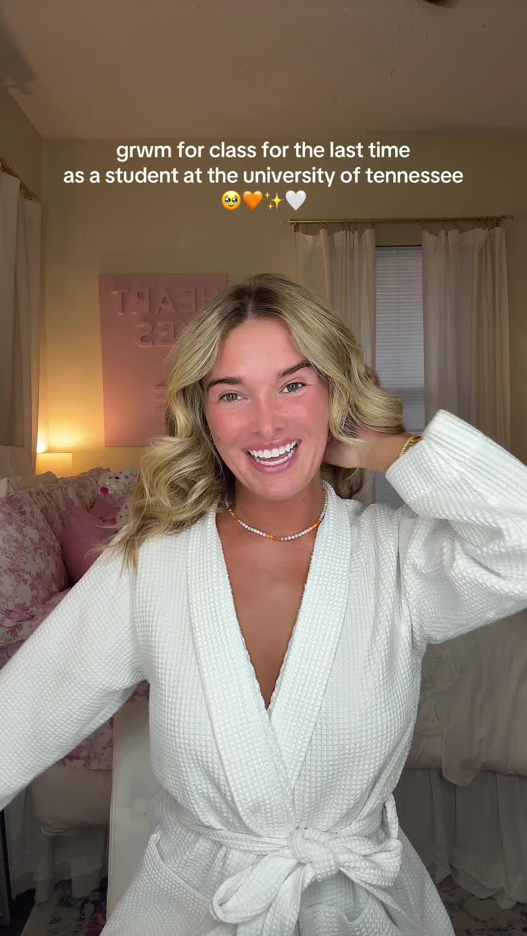 TikTok post by @laniekristin for Alani Nu. Caption reads: [...] at the university of tennessee 🥹🧡✨🤍....