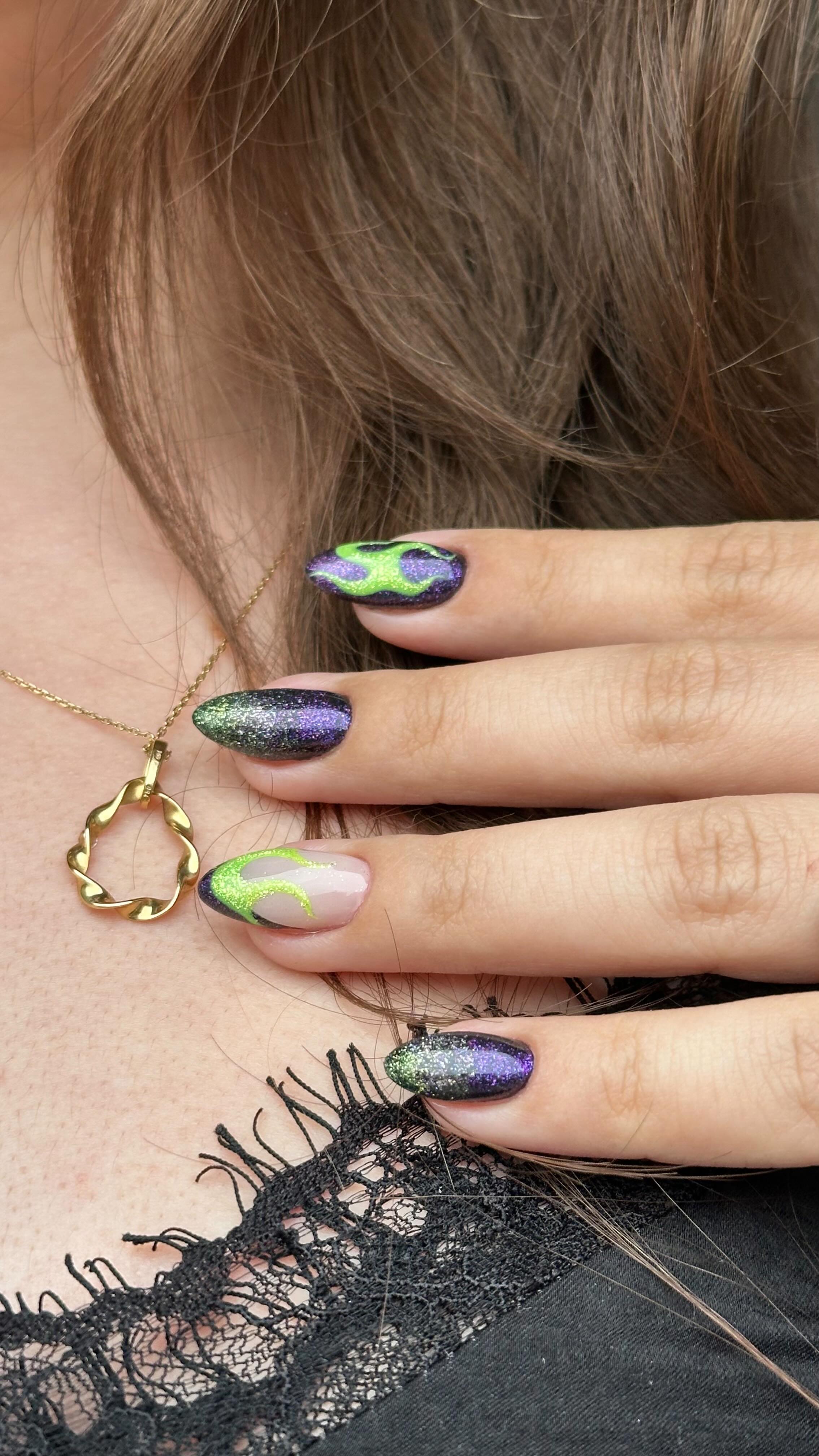 Instagram post by @simlynail for MakeUp Eraser. Caption reads: nails inspired by Disney villains💚✨

created for....