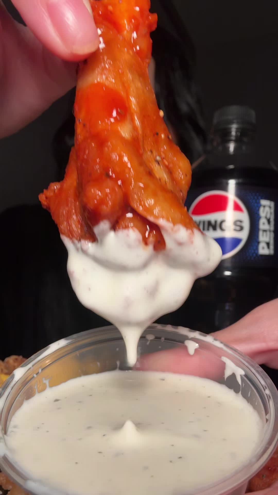TikTok post by @kittyfoodie for pepsi. Caption reads: #PepsiPartner Eat wings and drink my custom bottle....