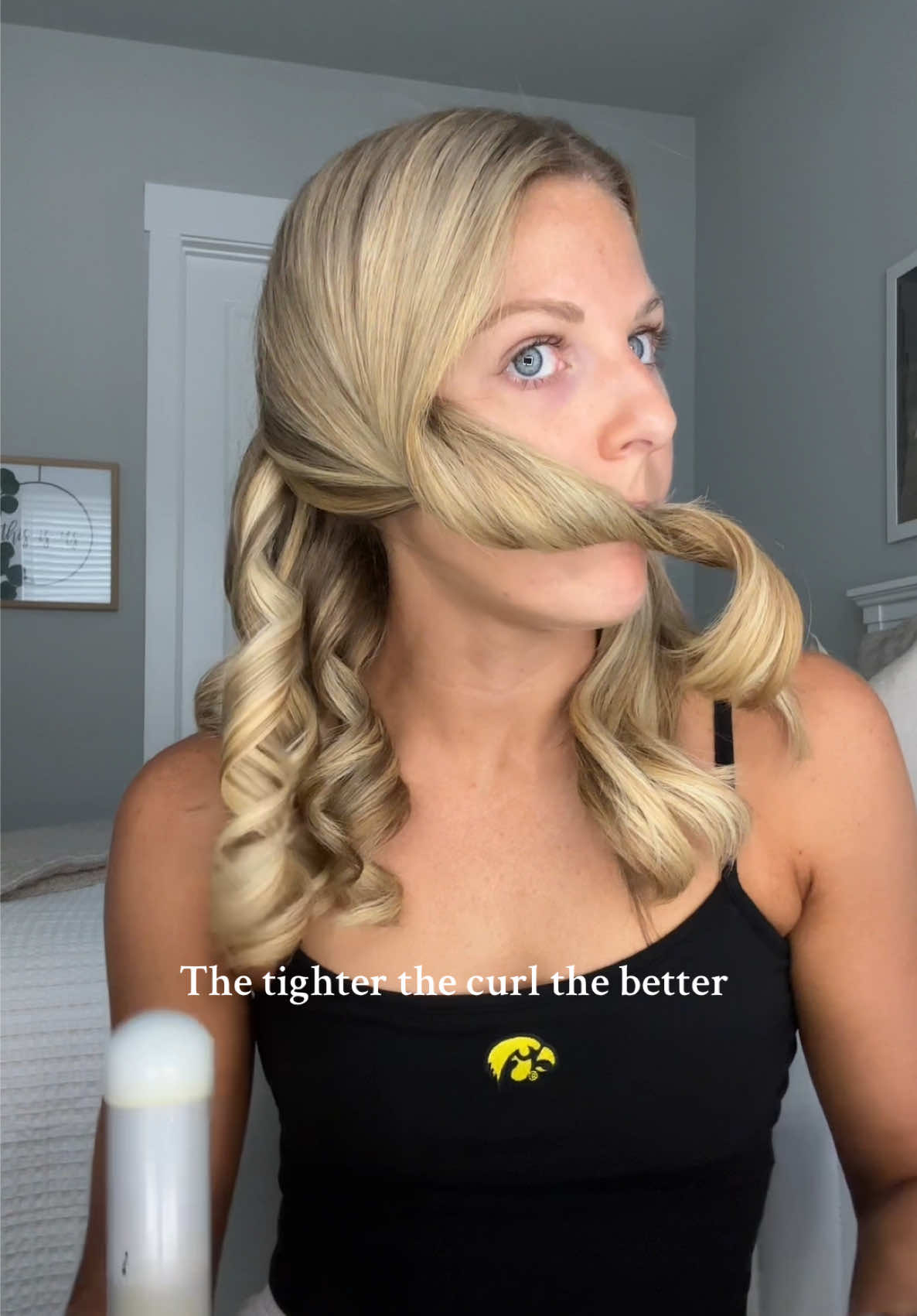 TikTok post by @kenn_hann for Beachwaver. Caption reads: I know holding my hair in my mouth is weird, but....