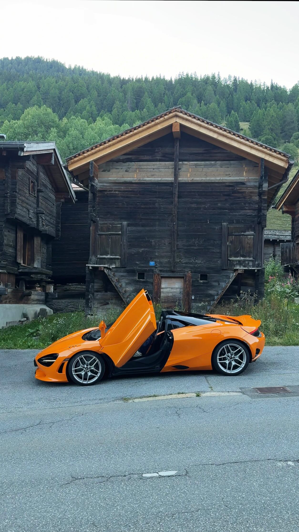 Instagram post by @ale_magni for McLaren. Caption reads: Nature sounds nice 🌲🐦‍⬛⛰️ … but McLaren sounds....
