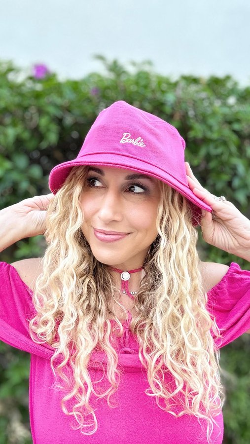 Instagram post by @jeannettekaplun for Love Your Melon. Caption reads: [...] reality. 

✨This Barbie hat is from....