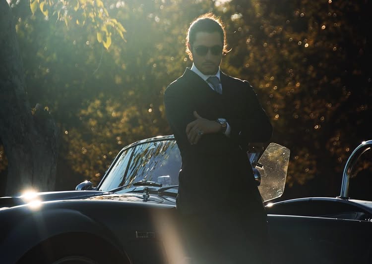 Instagram post by @dylan.finelli for Ford Models. Caption reads: 🏁.