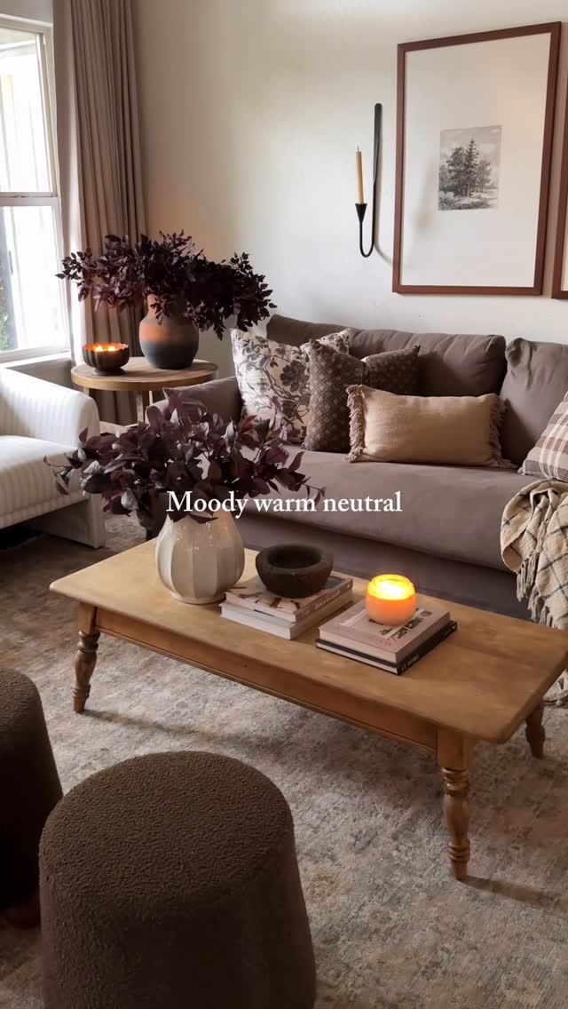 Instagram post by @house.on.oak.lane for Benjamin Moore. Caption reads: FAQ about our living room ✨🤎

Wall color? Grey....