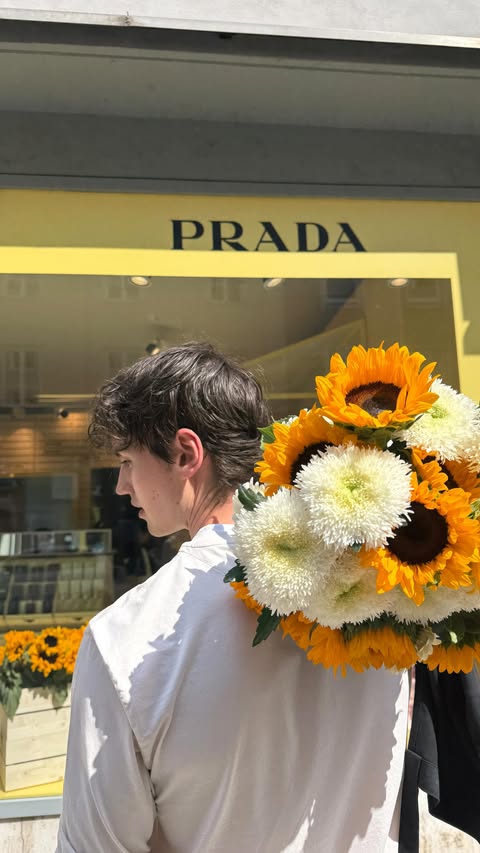 Instagram post by @moritz_hau for Prada. Caption reads: Anzeige | Who wants a bouquet? 💐 @pradabeauty .....