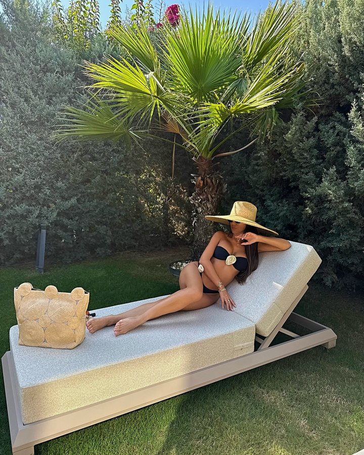 Instagram post by @goozdeyle for CULT GAIA. Caption reads: the golden hour glow ✨

#bikiniseason #sunsetvibes....