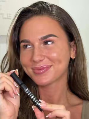 TikTok post by @angeliqueswift for Nanolash. Caption reads: Forever a lash serum girly 🎀✨💖 @Nanolash UK ad.
