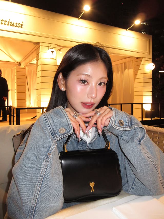 Instagram post by @monako0515 for AMI Paris. Caption reads: paris night in tokyo with @amiparis ❤️🌙 STAR....