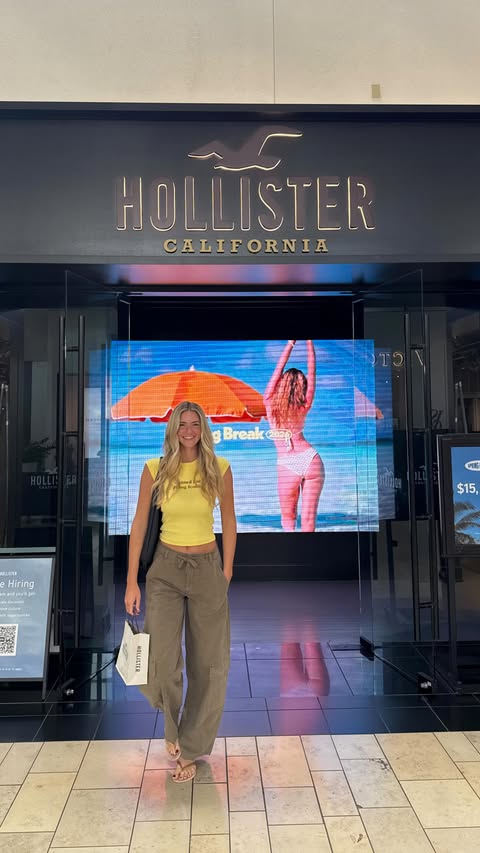 Instagram post by @emmaburnze for hollister. Caption reads: [...] can say is CHASE👏🏼YOUR👏🏼DREAMS👏🏼....