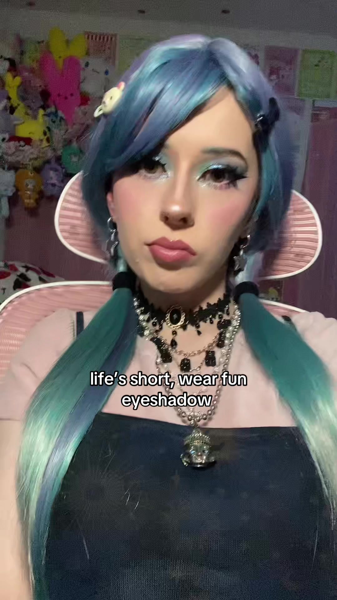 TikTok post by @therealslugsyy for Yva Expressions. Caption reads: [...] #alternative #glitter #eyeshadow @Yva....