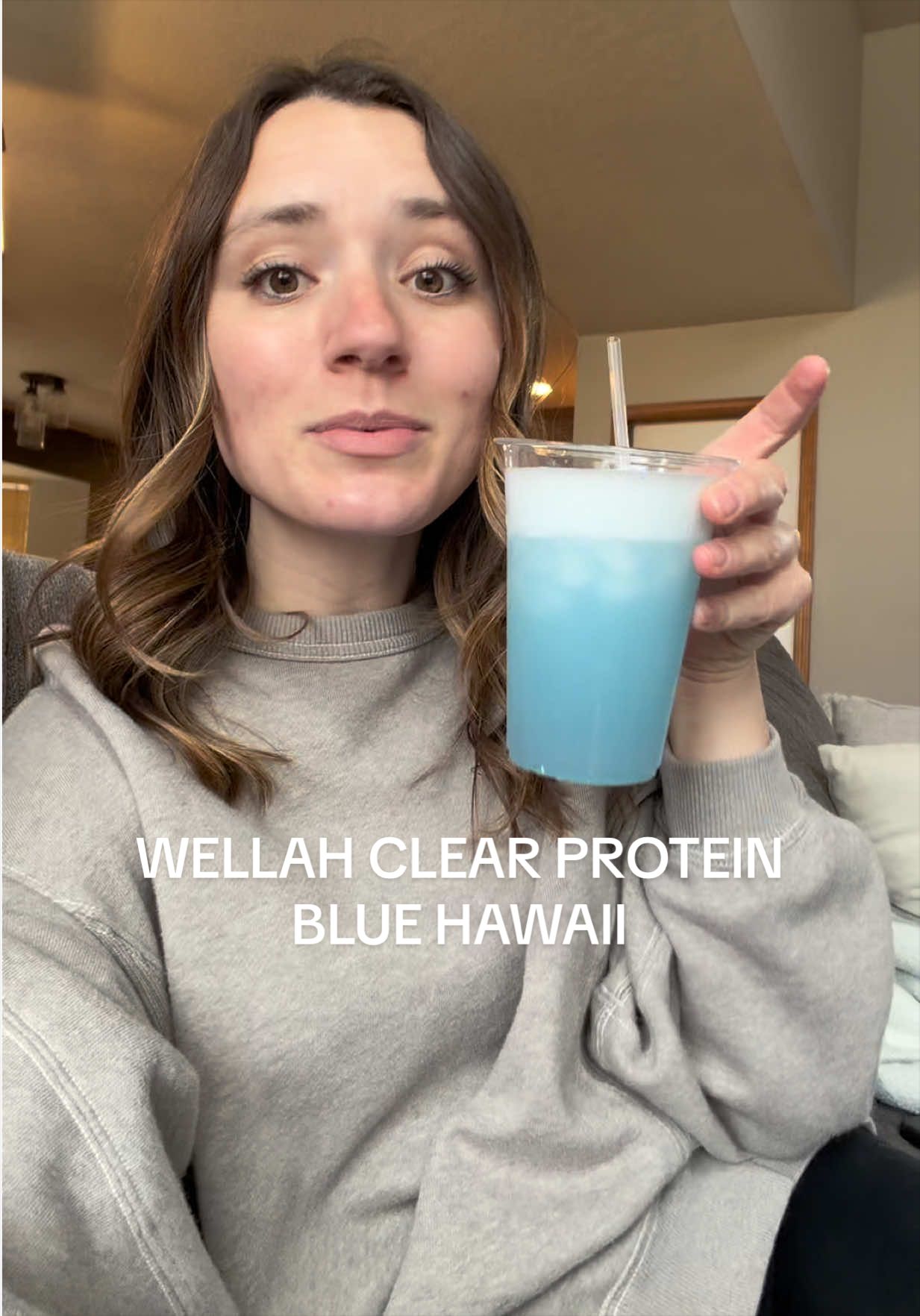 TikTok post by @thedailynatalie for Wellah Nutrition. Caption reads: @Wellah Nutrition #clearprotein #proteinjuice....