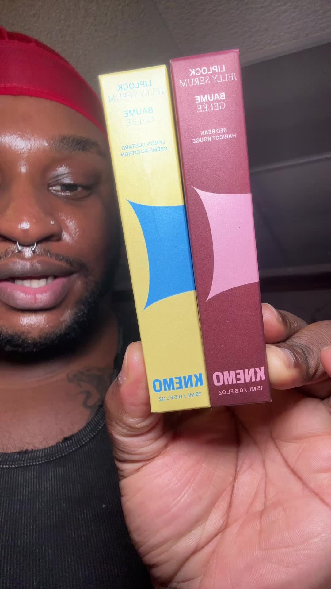 TikTok post by @poorlildarkbxyy for Knemo Beauty. Caption reads: @KNEMO™ I wasn’t aware of you lip gloss game....