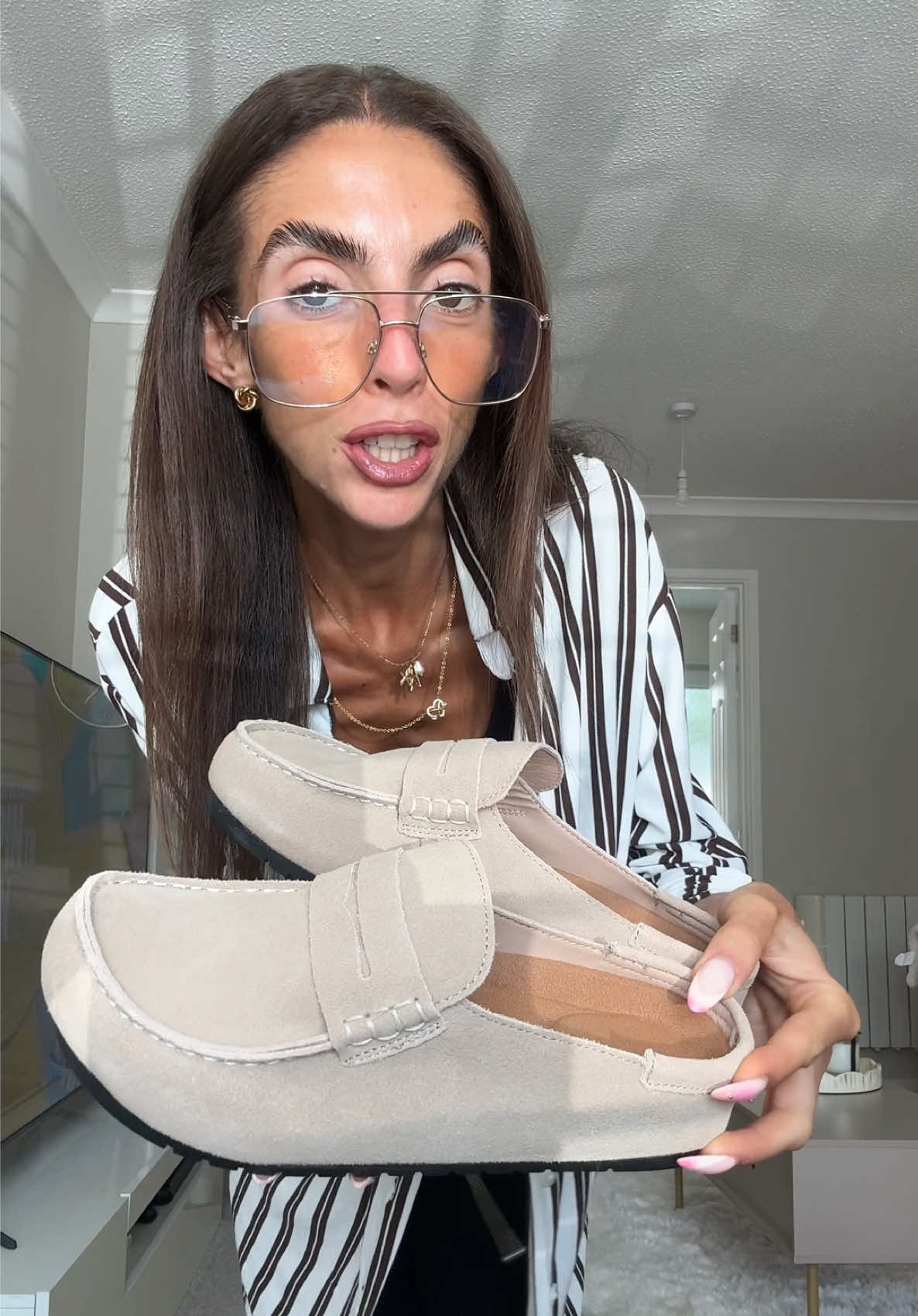TikTok post by @nicolerosadavis for Evellyhootd. Caption reads: [...] #loafers #clogs #comfyshoes #birks....